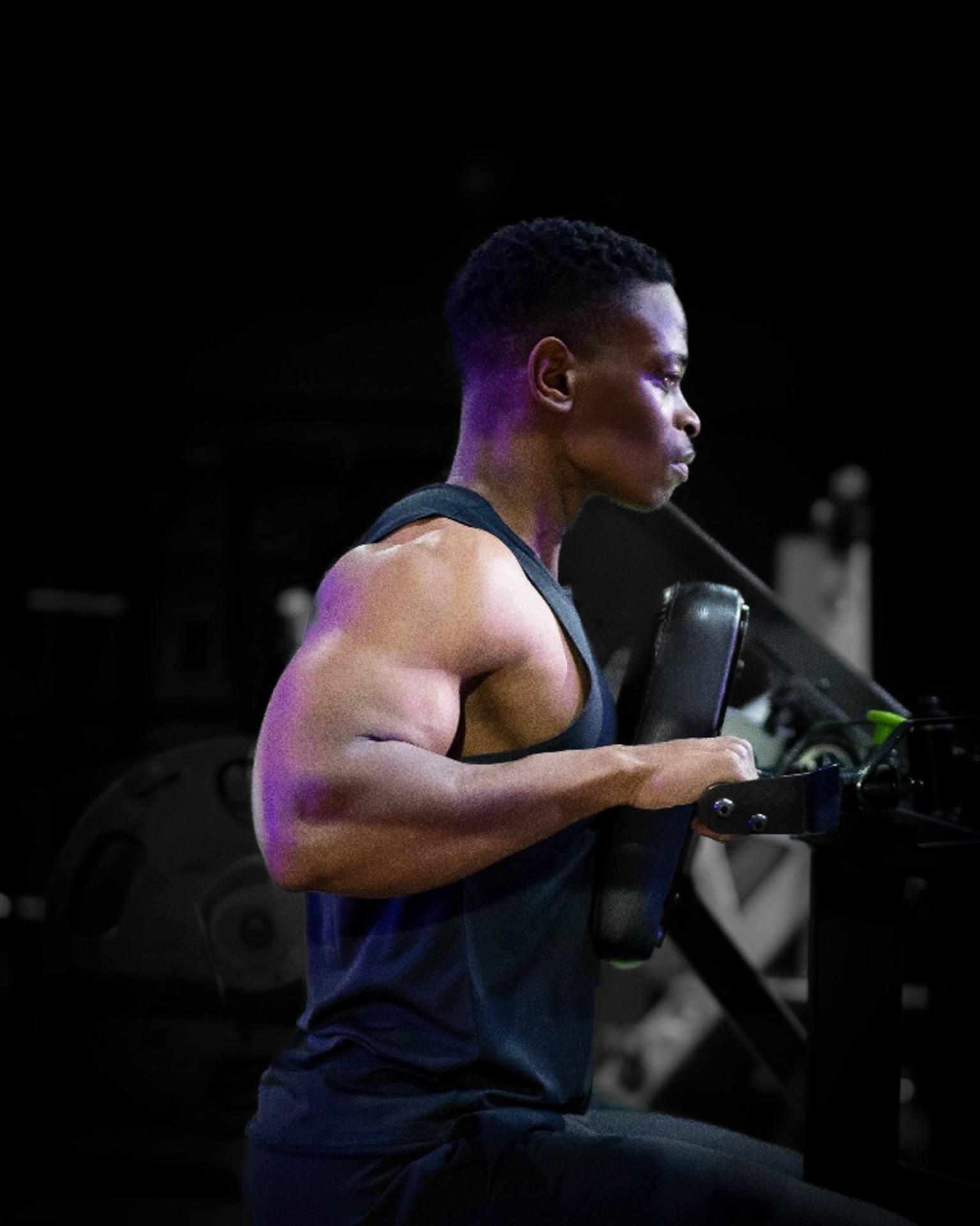 Man training on resistance machine
